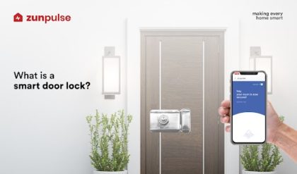 smart door lock on door with phone in hand